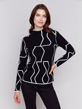 Load image into Gallery viewer, Black/Cream Reversible Jacquard Mock Neck Sweater
